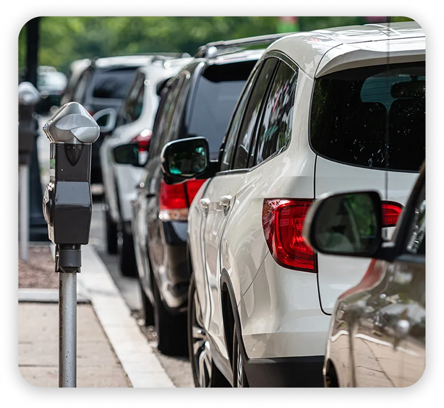 Cars parked at an on-street pay station