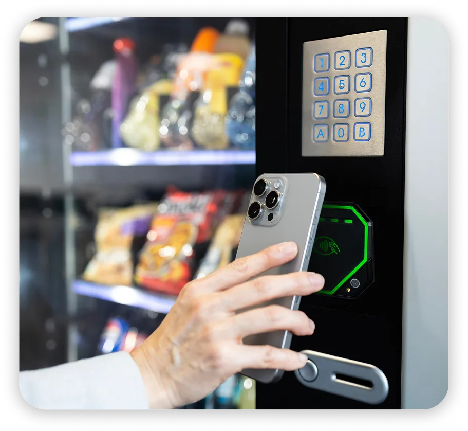 Cashless payment reader on an unattended vending machine